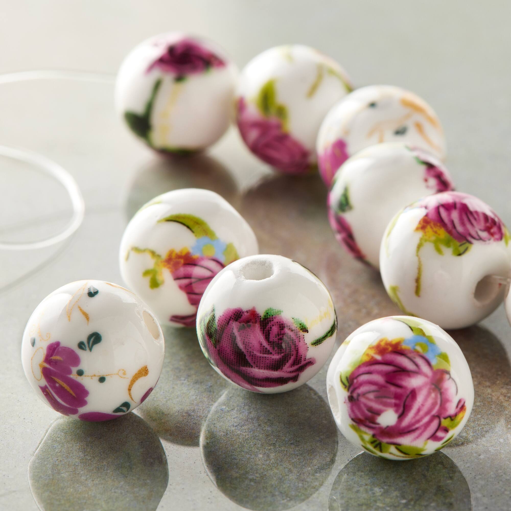 12 Pack: Ceramic Floral Round Beads, 12mm by Bead Landing™